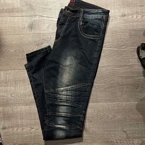 Dark denim distressed jeans